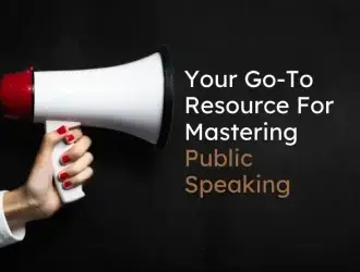 Hand holding megaphone for public speaking