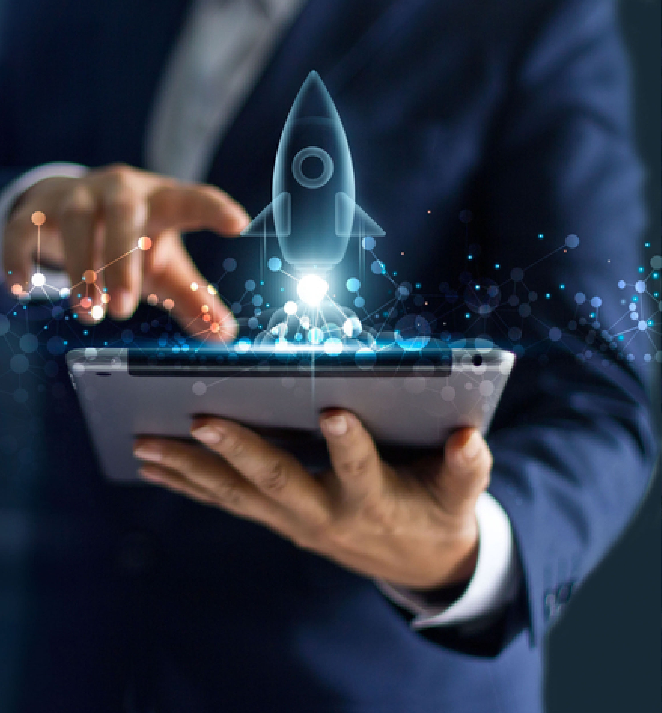 Businessman using tablet with rocket graphic