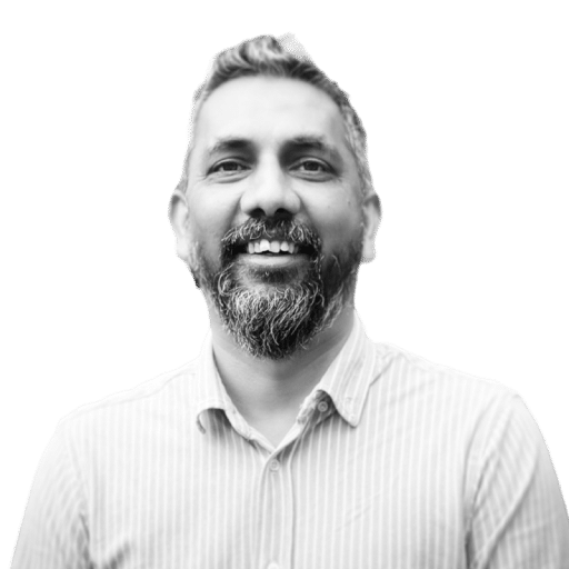 Smiling man in leadership training context